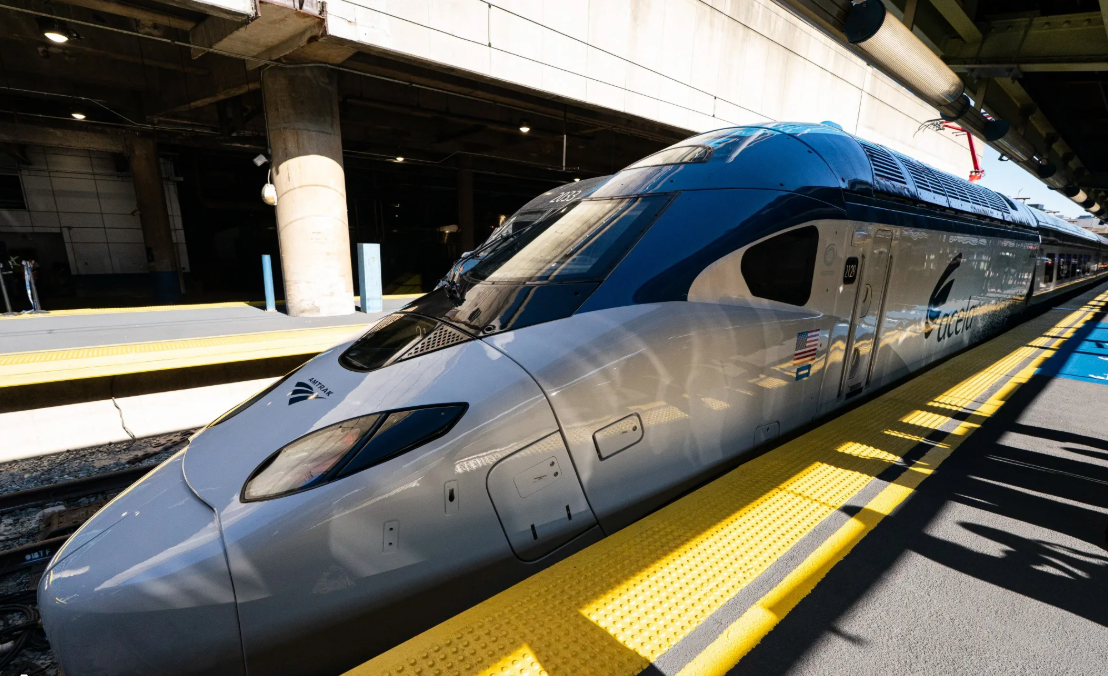High-speed passenger train on modern rail infrastructure — ERS composite ties support passenger and freight operations across all rail classes